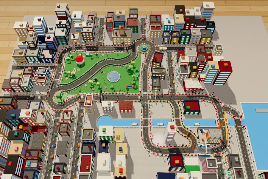 A city of toy-brick buildings with a park and a harbour