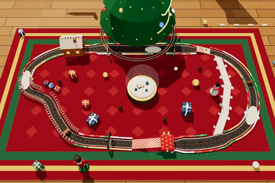 A track on a red rug under the Christmas tree, with presents and a toy train