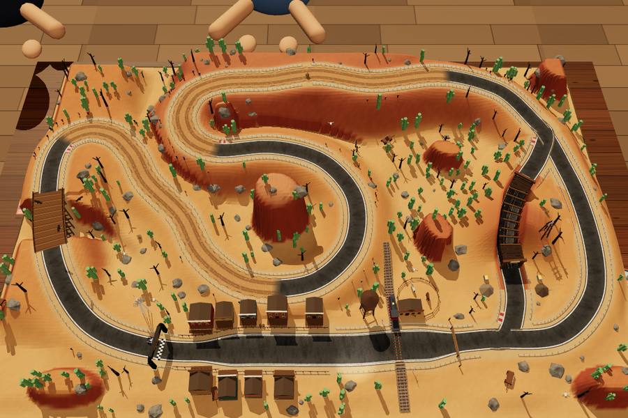 A Wild West diorama with mesas, a wooden saloon town and a mine